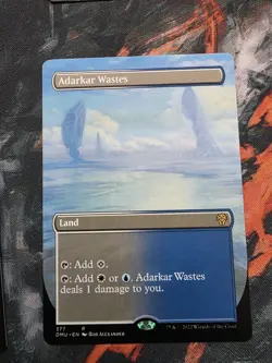 Adarkar Wastes Borderless 377 NM Dominaria United Regular - Image 1
