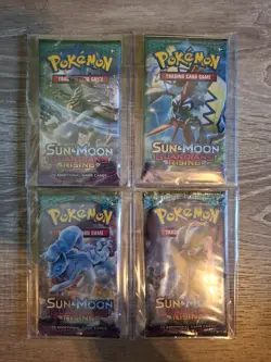 Lot (4) POKEMON SUN MOON GUARDIANS RISING Sealed 10-Card BOOSTER PACKS (Art Set) - Image 1