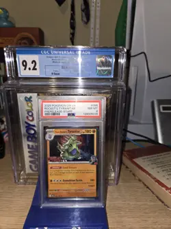 2025 POKEMON DESTINED RIVALS PRERELEASE-STAFF #096 TEAM ROCKET'S TYRANITAR PSA 8 - Image 1