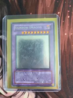 Yugioh Elemental Hero Chaos Neos/Rainbow Dragon Misprint GLAS-EN036 1st Edition - Image 1