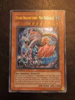 Yu-Gi-Oh ULTRA RARE OCEAN DRAGON LORD NEO-DAEDALUS CORRECTED LONG TEXT SD4-EN001 - Image 1