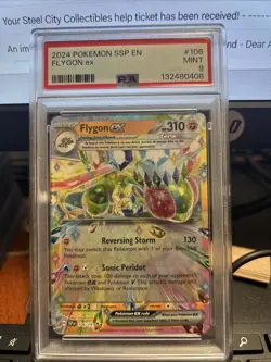2024 POKEMON SSP EN-SURGING SPARKS #106 FLYGON EX PSA 9 - Image 1