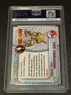 1999 Topps Pokemon Alakazam Rainbow Foil PSA 7 NM #65 - Image 2