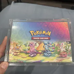 Pokemon TCG Prismatic Evolutions Mini Tin with acrylic case sealed - Image 2
