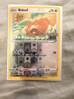 Pokemon Bidoof 059/078 Pokemon GO Reverse Holo peelable ditto card - Image 1