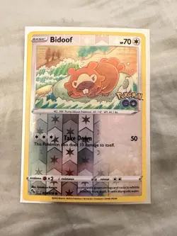 Pokemon Bidoof 059/078 Pokemon GO Reverse Holo peelable ditto card - Image 1