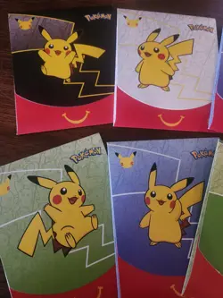 Sealed Pokemon 25th Anniversary McDonald's Happy Meal card packs from 2021 - Image 2