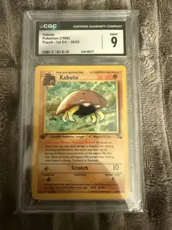 1999 Pokemon Fossil 1st Edition Kabuto #50 CGC 9 Mint - Image 1