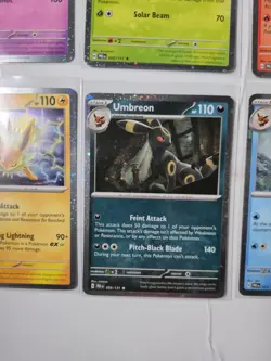 Pokemon Prismatic Evolutions Cosmo Promo Cards & EMPTY Mini Tins Costco Pack (8) - Image 3