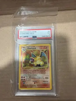 1999 POKEMON BASE SET UNLIMITED #4 CHARIZARD-HOLO PSA 3 - Image 1