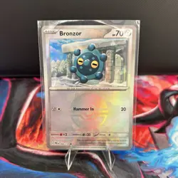 Pokemon TCG Bronzor Poke Ball Reverse Holo Card 066/131 Prismatic Evolutions - Image 1