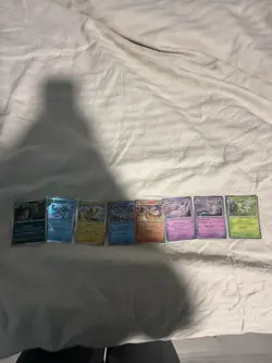 Pokemon Prismatic Evolutions 8 Mini Tins Promo Cards Costco - Image 1
