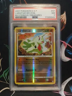 PSA 7 NM-MT Larvitar 2007 Pokemon Mysterious Treasures #87 - Image 1