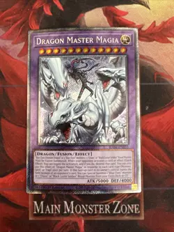 DRAGON MASTER MAGIA - PLATINUM SECRET RARE - Near Mint - RA04-EN055 - Yugioh - Image 1