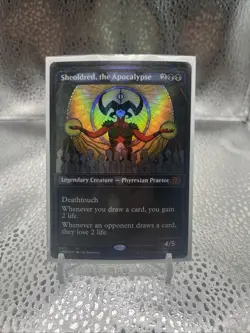 Sheoldred, the Apocalypse (Textured Foil) Dominaria United Foil - Image 1