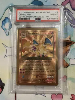 PSA 8 - 2021 Pokemon Celebrations UPC CHARIZARD Gold Metal Card #4 (1913) - Image 1