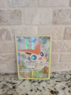 Victini XY117 Holo Promo Card Near Mint Condition - Image 1