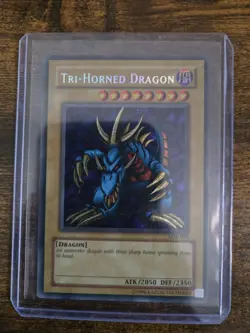 Old School 1996 YuGiOh Secret Rare Holofoil Card Tri-Horned Dragon LOB-000 - Image 1