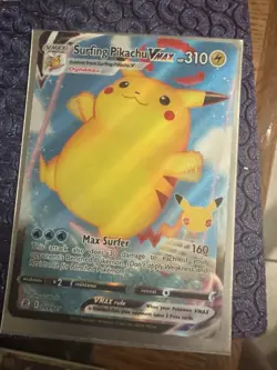 Pokemon Surfing Pikachu VMAX Ultra Rare Holo Celebrations 009/025 Card - Image 1