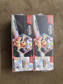 Pokemon Prismatic Evolutions Surprise Box And Booster Bundle Sealed (2-packs) - Image 1