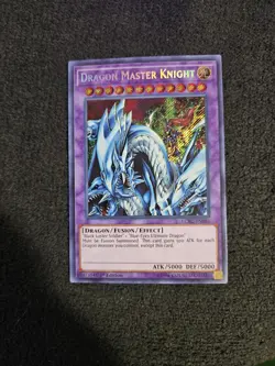 Yugioh Dragon Master Knight LCKC-EN065 Secret Rare - Image 1