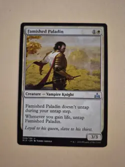Famished Paladin 8/196 MTG NM Rivals of Ixalan (C) - Image 1