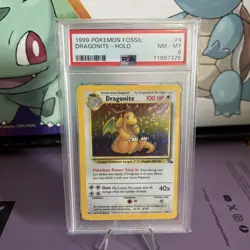 1999 POKEMON FOSSIL #4 DRAGONITE-HOLO PSA 8 - Image 1