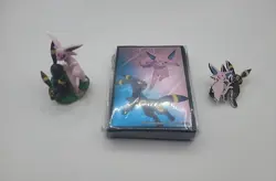 Pokemon Prismatic Evolutions Figure Sleeves and Pin Badge Umbreon and Espeon - Image 1
