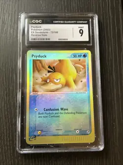 CGC 9 MINT Psyduck 2003 EX Sandstorm 73/100 Reverse Holo Pokemon Card - Image 1
