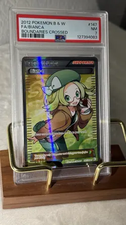 Pokemon Bianca Full Art Trainer PSA 7 – Boundaries Crossed 147/149 - Image 1