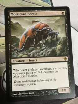 C5134 MAGIC MTG RISE OF THE ELDRAZI MORTICIAN BEETLE #117 RARE NM - Image 1