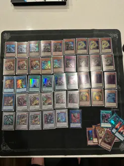 Yu-Gi-Oh! Lot with playsets of staples, deck cores, Mana moon sleeves, and bulk - Image 1