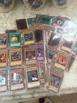 Lot of 125+ Yu-Gi-Oh Cards w/ Card Pages (lightly played) - Image 1