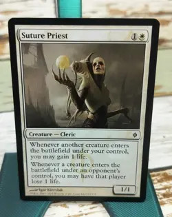 Suture Priest New Phyrexia Lightly Played - Image 1