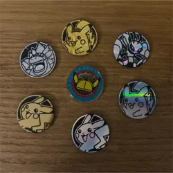 Nintendo Pokemon XY Coins Lot of 7 - Pikachu, Detective Pikachu, Mega Evolutions - Image 1