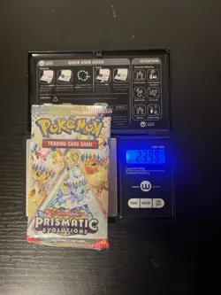 Pokemon TCG Prismatic Evolutions Heavy Booster Pack 23.99 Grams Factory Sealed - Image 1