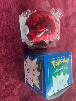 1999 Pokemon 23k Gold Plated Togepi Trading Card In Plastic wrap opened - Image 1