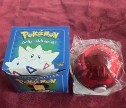 1999 Pokemon 23k Gold Plated Togepi Trading Card In Plastic wrap opened - Image 3