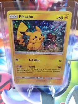 Pikachu SM86 Cosmos Holo Black Star Promo Pokemon Card - Image 1
