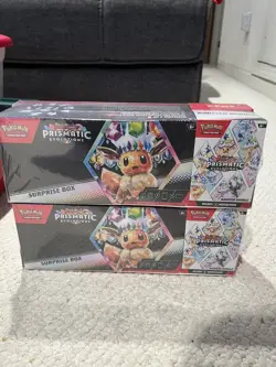 Pokemon Prismatic Evolutions Surprise Box And Booster Bundle (SET OF 2) - Image 1