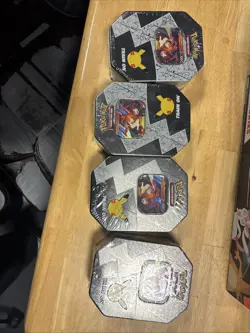 x4 pokemon celebrations international tin lances charizard v - Image 1