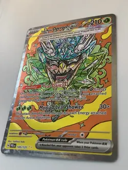 Pokemon Teal Mask Ogerpon ex 145/131 Sv: Prismatic Evolutions Holo - Image 2