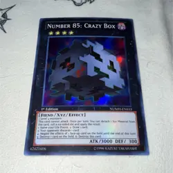 Yu-Gi-Oh! TCG Number 85: Crazy Box NUMH-EN033 1st Edition Super Rare Fiend - Image 1