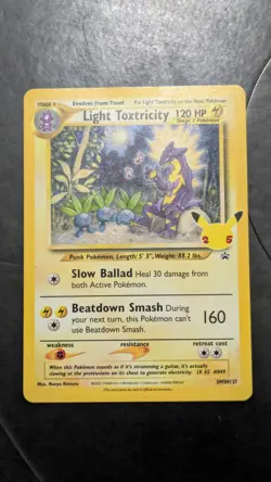 LP Light Toxtricity SWSH137 Celebrations Black Star Promo Holo Pokemon Card' - Image 1