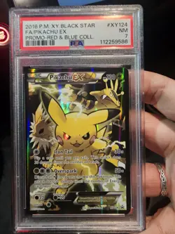 Pokemon Pikachu EX 2016 Red and Blue Collection Black Star Promo, PSA 7 - Image 1