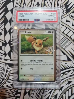 Eevee 133/165 Cosmos Holo NM-MINT PSA 8 Pokemon 2025 Holiday Calendar (512) - Image 1