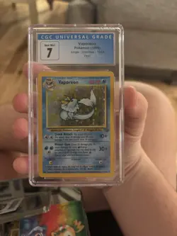 Pokemon Vaporeon Jungle Unlimited Holo Rare CGC 7 12/64 1999 English - Image 1