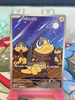 Pokemon - Helioptile 143/132 Me01: Mega Evolution Holo - Image 1