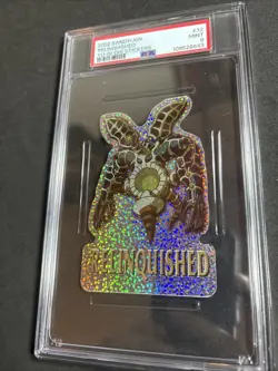 PSA 9 Mint 2002 Yu-Gi-Oh Series 1 SandyLion Relinquished #32 Prismatic Sticker - Image 1