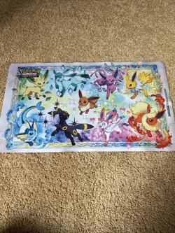 POKEMON PRISMATIC EVOLUTIONS - SPECIALTY PREMIUM COLLECTION SPC PLAYMAT - QTY - - Image 1